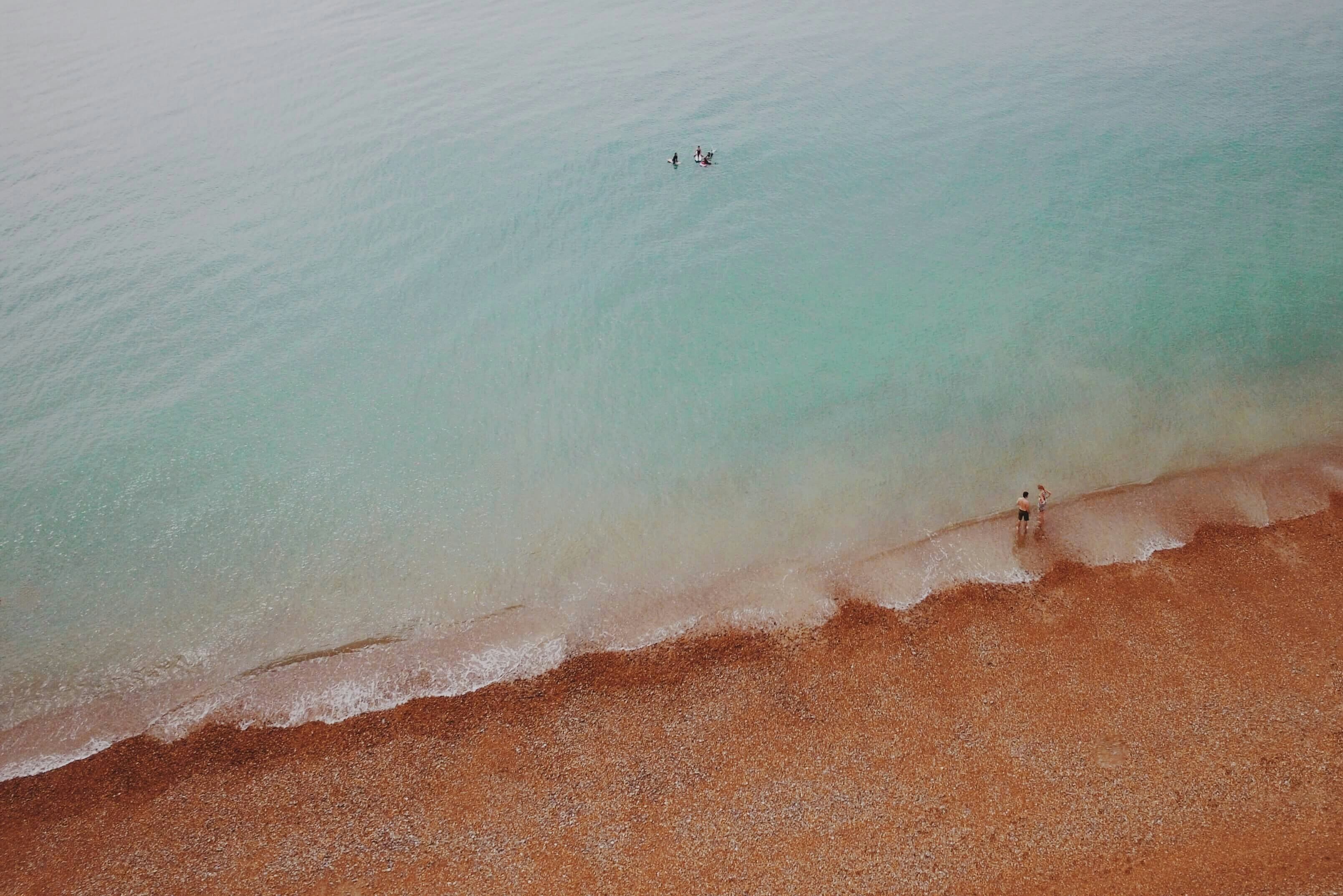 aerial view of people at seashore